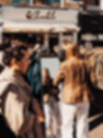 A girl shopping at a car boot sale 